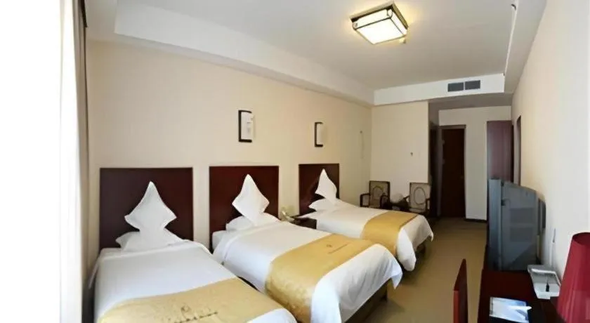 Bed in Beijing Ruyi Business Hotel