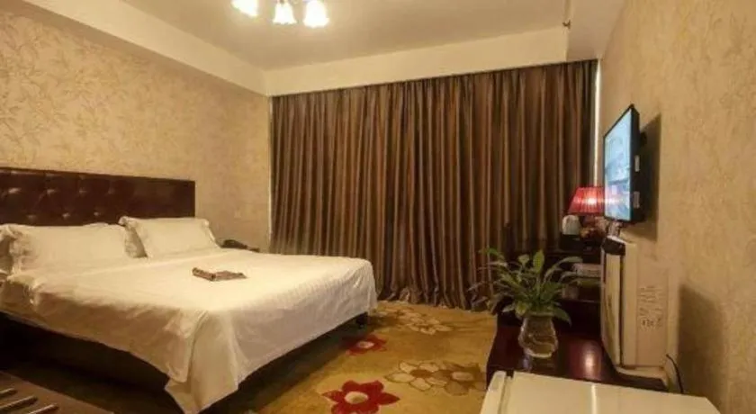 Bed in Beijing Ruyi Business Hotel