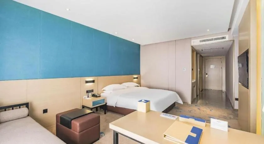 Bed in Beijing Ruyi Business Hotel