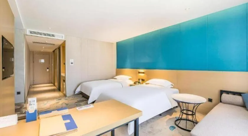 Bed in Beijing Ruyi Business Hotel