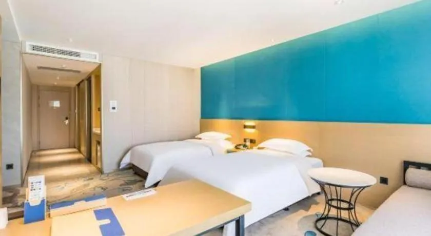 Bed in Beijing Ruyi Business Hotel