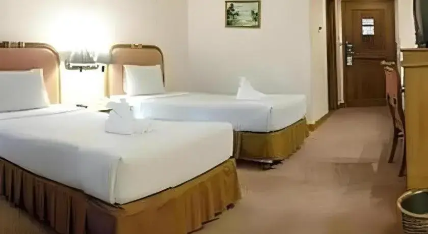 Bed in Sakura Hotel Bed in Sakura Hotel