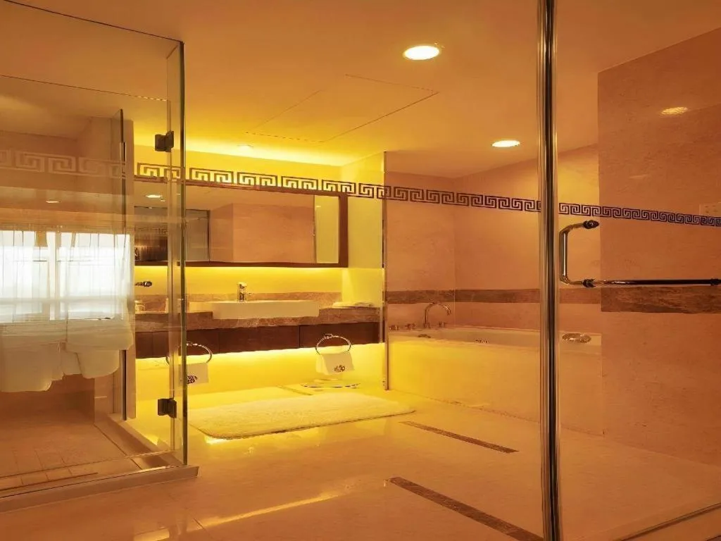 Bed in Yangzhou Hentique Huijin Resort Hotel