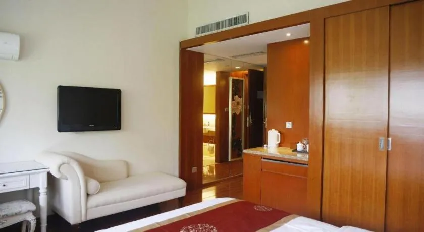 Bed in Yangzhou Hentique Huijin Resort Hotel