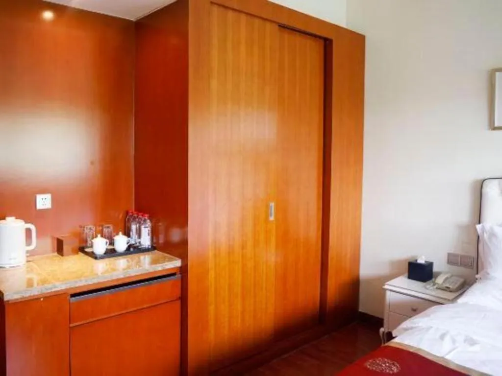 Bed in Yangzhou Hentique Huijin Resort Hotel