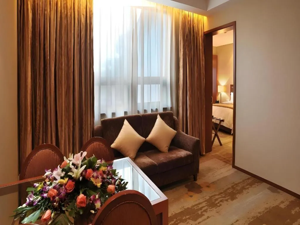 Bed in Yangzhou Hentique Huijin Resort Hotel