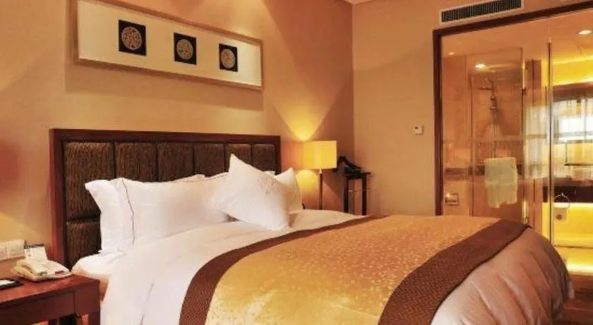 Bed in Yangzhou Hentique Huijin Resort Hotel