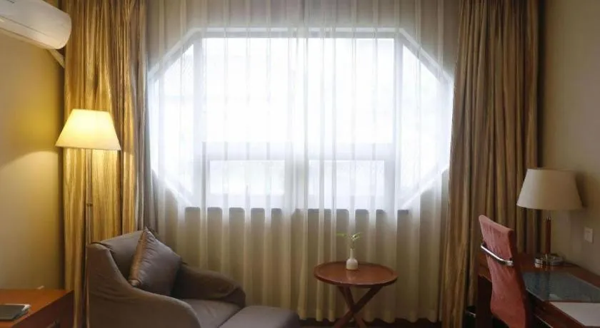 Bed in Yangzhou Hentique Huijin Resort Hotel