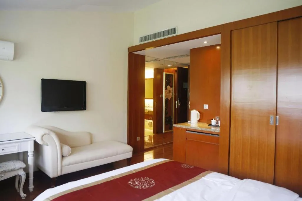 Bed in Yangzhou Hentique Huijin Resort Hotel