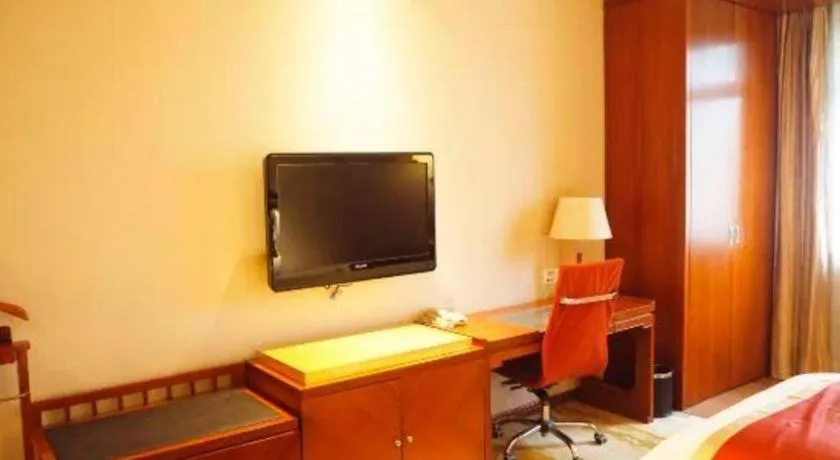 Bed in Yangzhou Hentique Huijin Resort Hotel