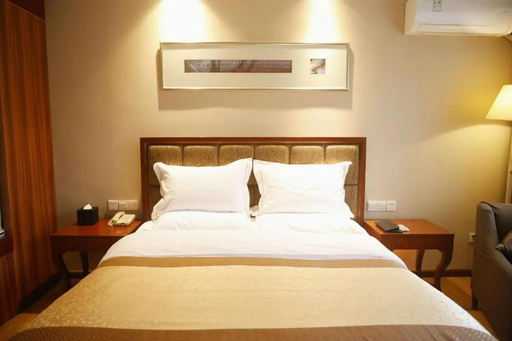 Bed in Yangzhou Hentique Huijin Resort Hotel