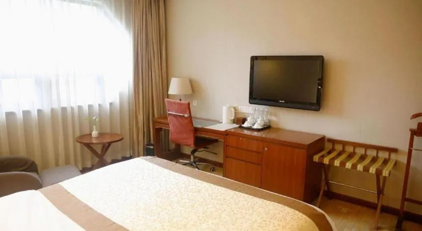 Bed in Yangzhou Hentique Huijin Resort Hotel