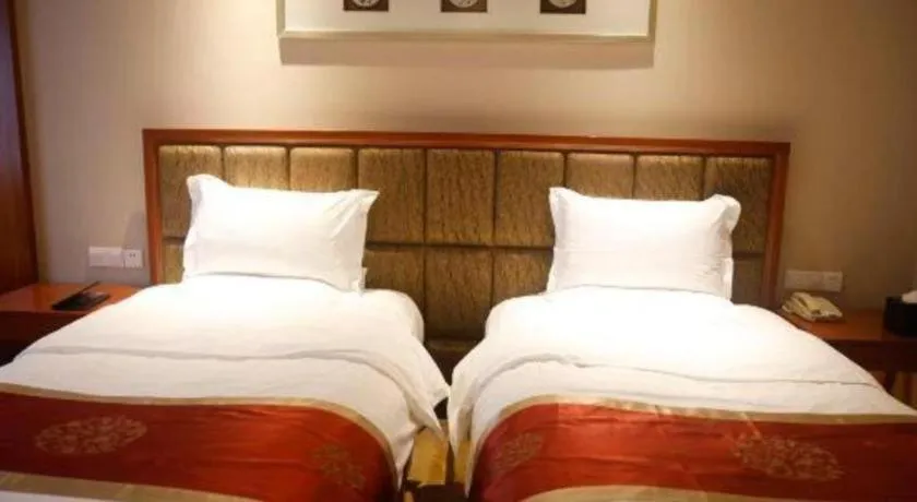 Bed in Yangzhou Hentique Huijin Resort Hotel