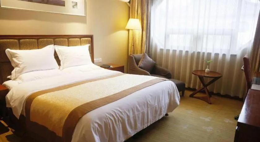 Bed in Yangzhou Hentique Huijin Resort Hotel