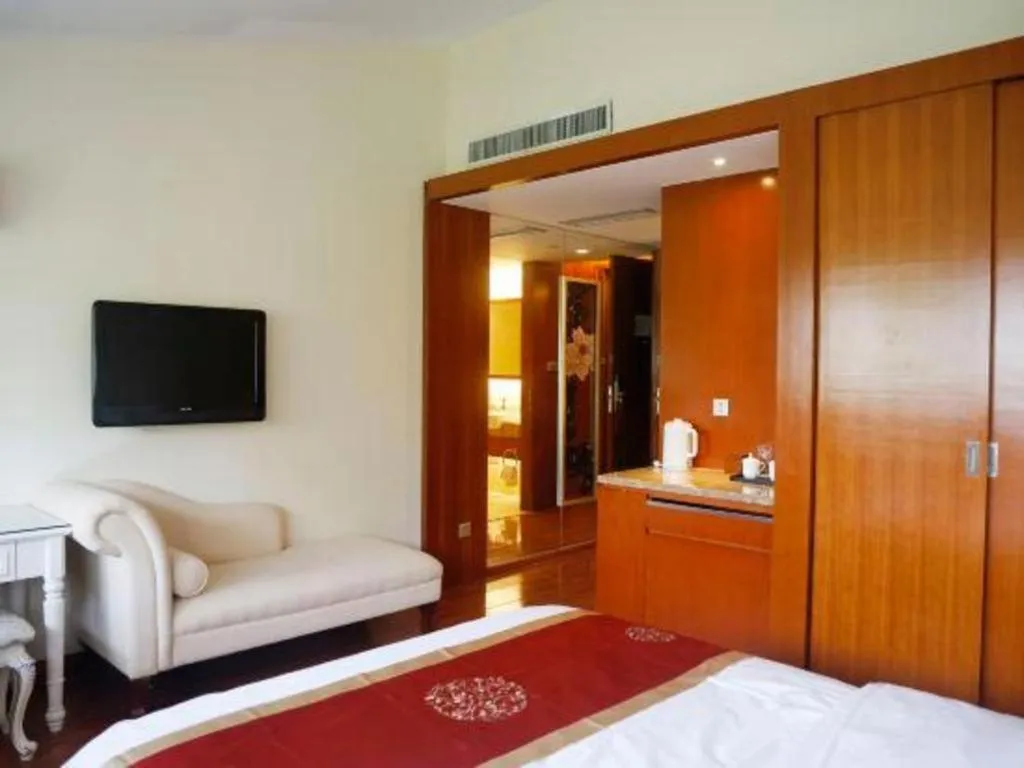 Bed in Yangzhou Hentique Huijin Resort Hotel