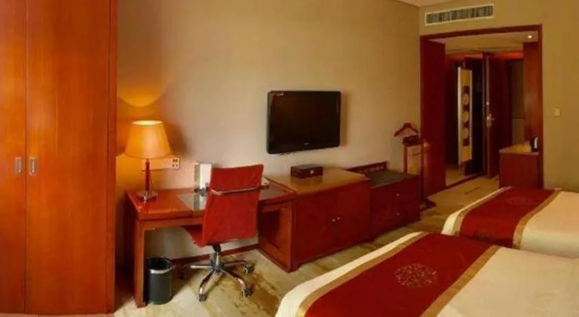 Bed in Yangzhou Hentique Huijin Resort Hotel