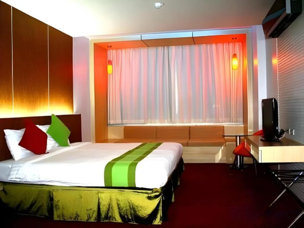 Bed in V-One Hotel Korat