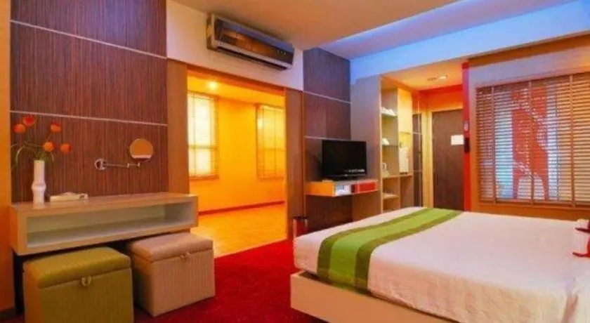 Bed in V-One Hotel Korat