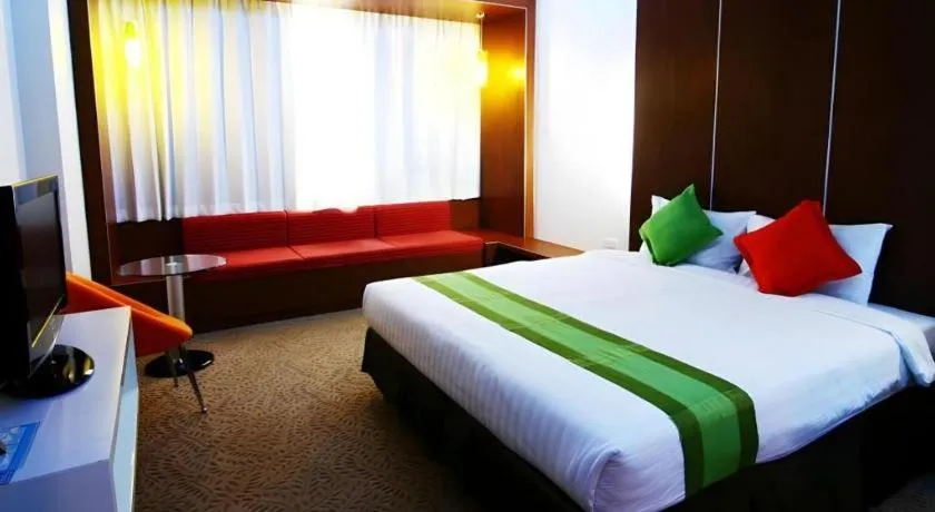 Bed in V-One Hotel Korat