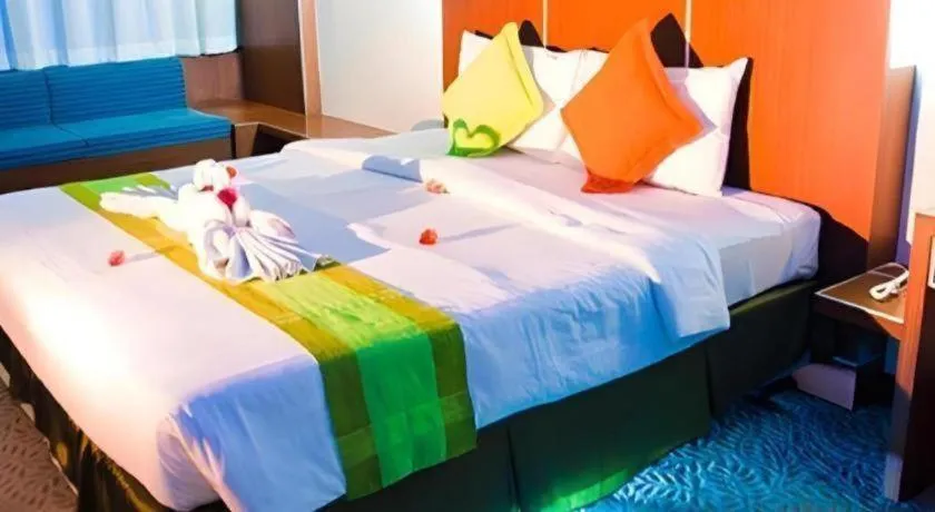 Bed in V-One Hotel Korat