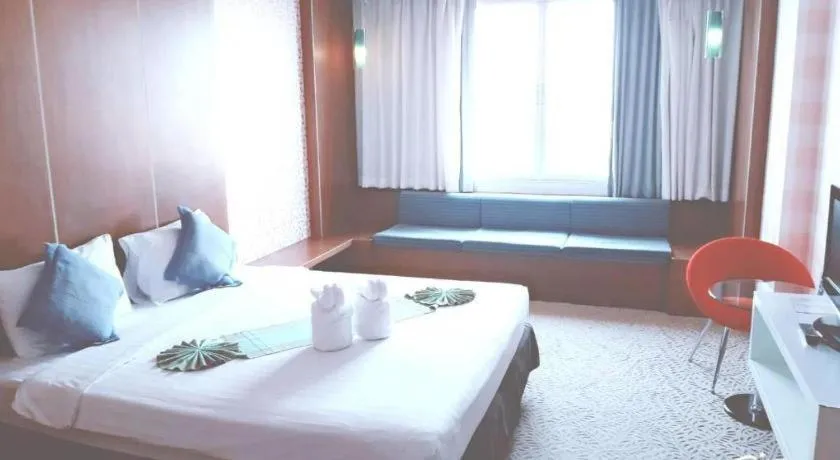 Bed in V-One Hotel Korat