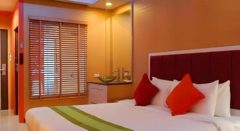 Bed in V-One Hotel Korat