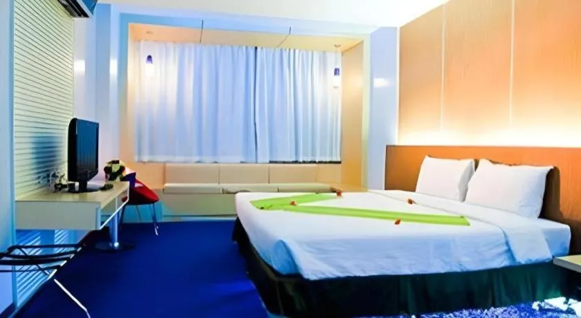 Bed in V-One Hotel Korat
