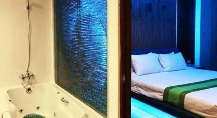 Bed in V-One Hotel Korat