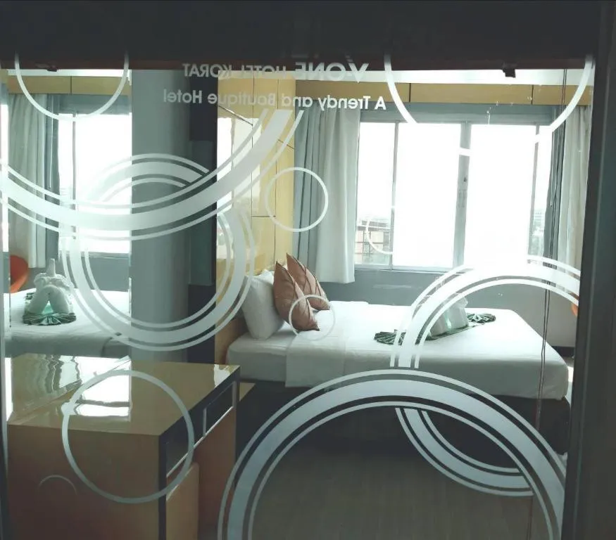 Bed in V-One Hotel Korat