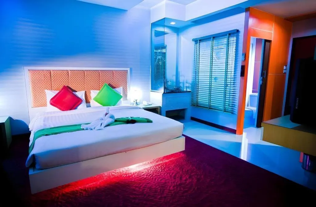 Bed in V-One Hotel Korat