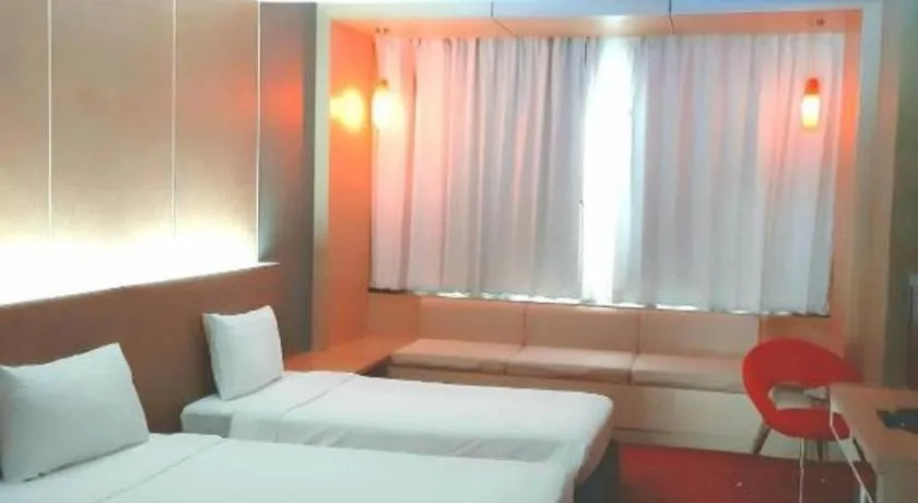 Bed in V-One Hotel Korat