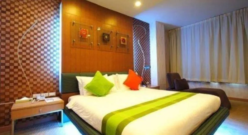 Bed in V-One Hotel Korat