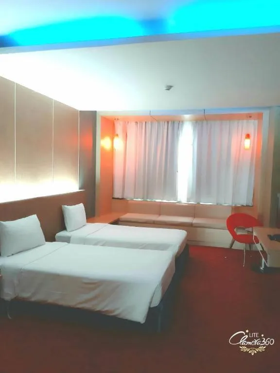 Bed in V-One Hotel Korat