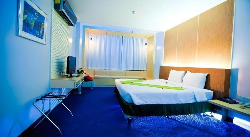 Bed in V-One Hotel Korat