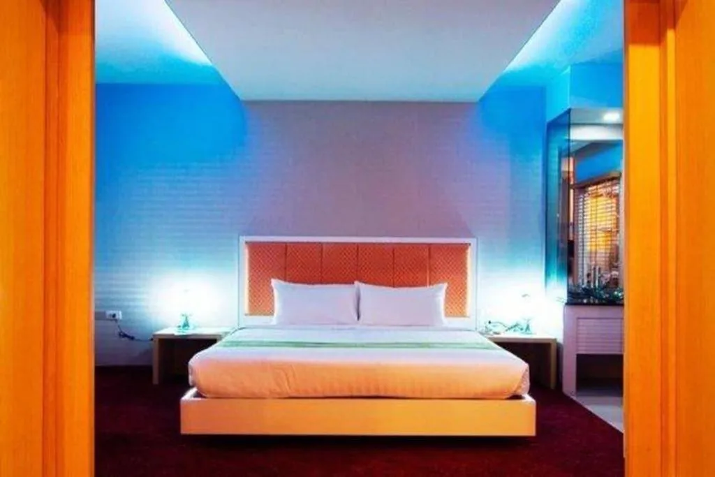 Bed in V-One Hotel Korat