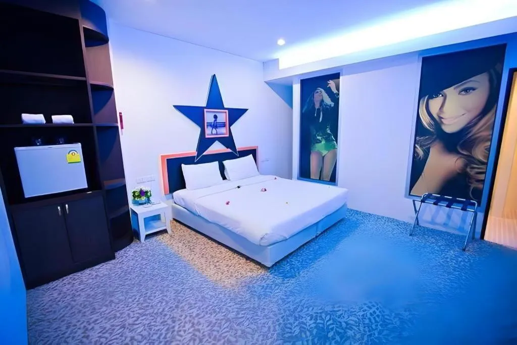 Bed in V-One Hotel Korat