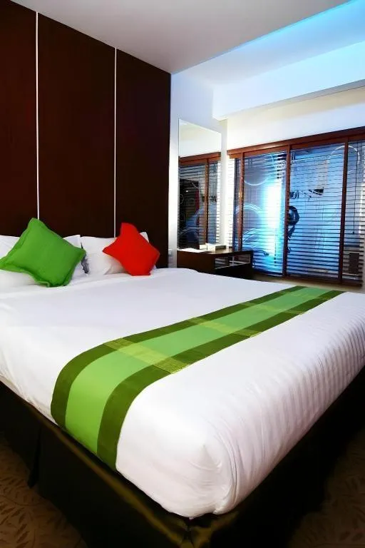 Bed in V-One Hotel Korat