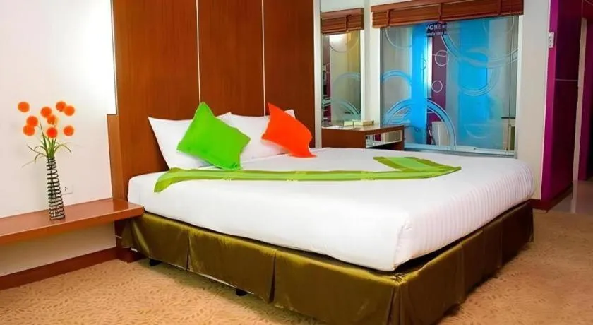 Bed in V-One Hotel Korat