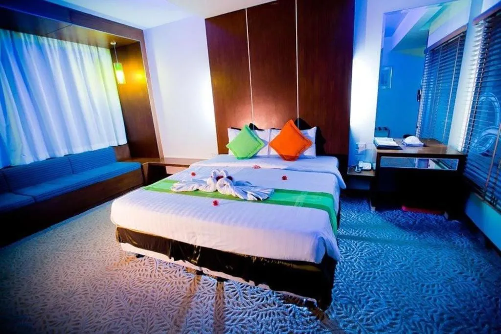 Bed in V-One Hotel Korat