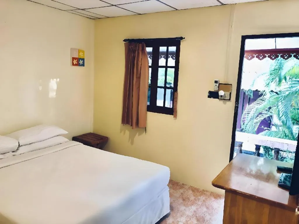 Bed in Phangan Cabana Resort