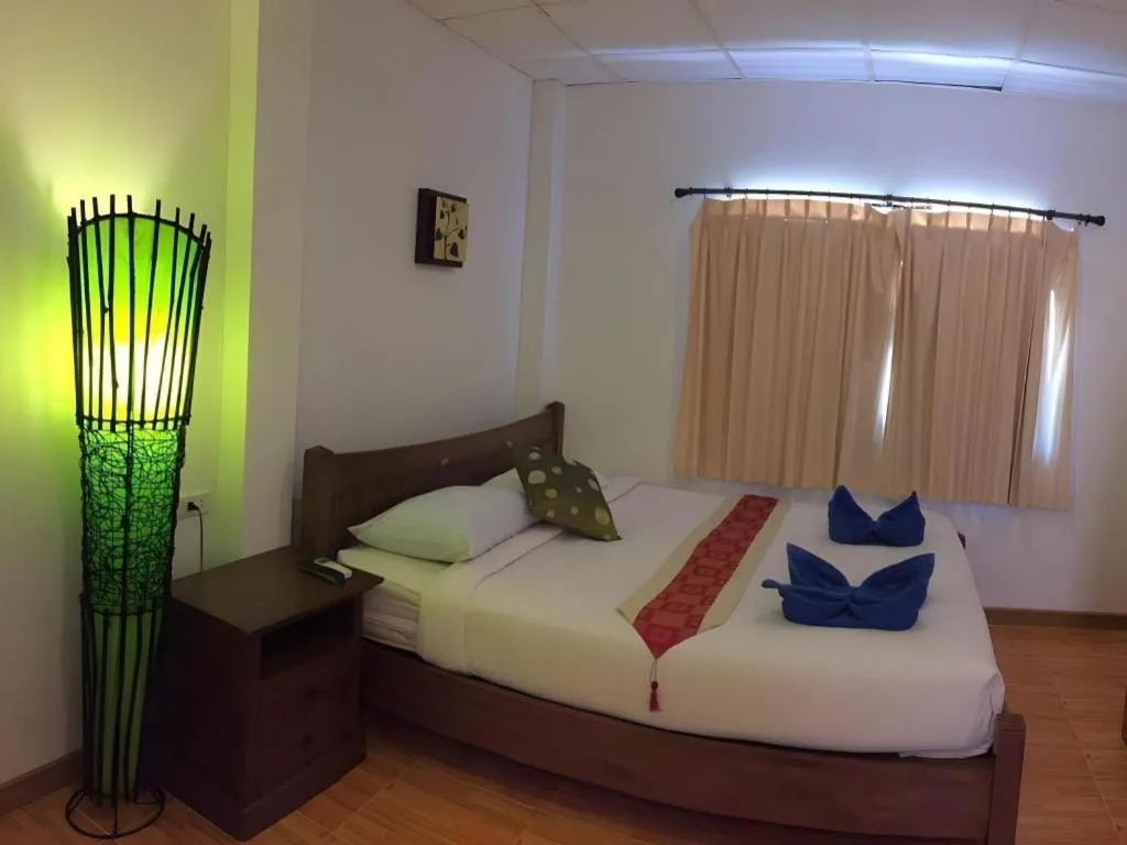 Bed in Phangan Cabana Resort