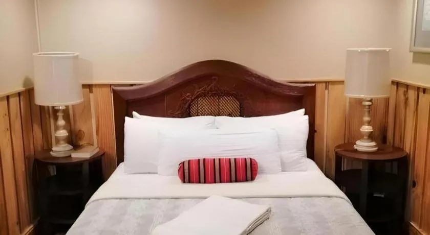 Bed in Mountain Lodge Hotel and Restaurant
