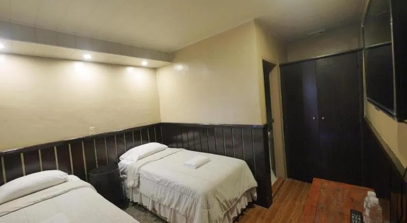 Bed in Mountain Lodge Hotel and Restaurant