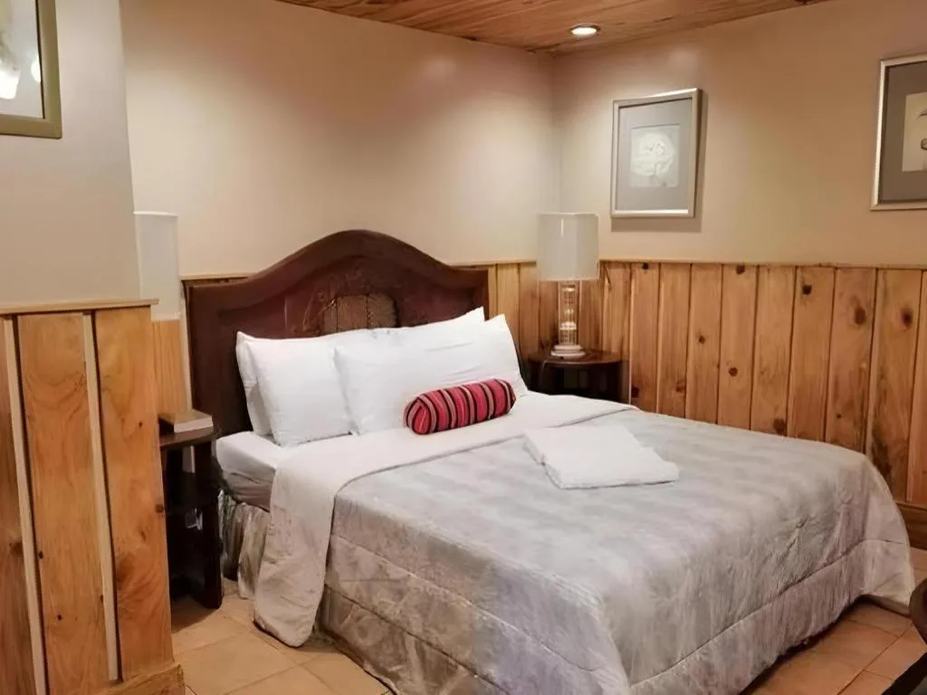 Bed in Mountain Lodge Hotel and Restaurant