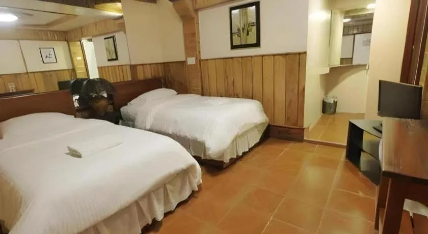 Bed in Mountain Lodge Hotel and Restaurant