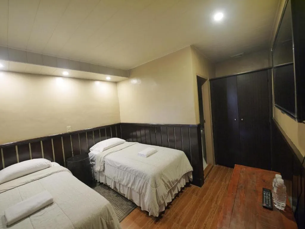 Bed in Mountain Lodge Hotel and Restaurant