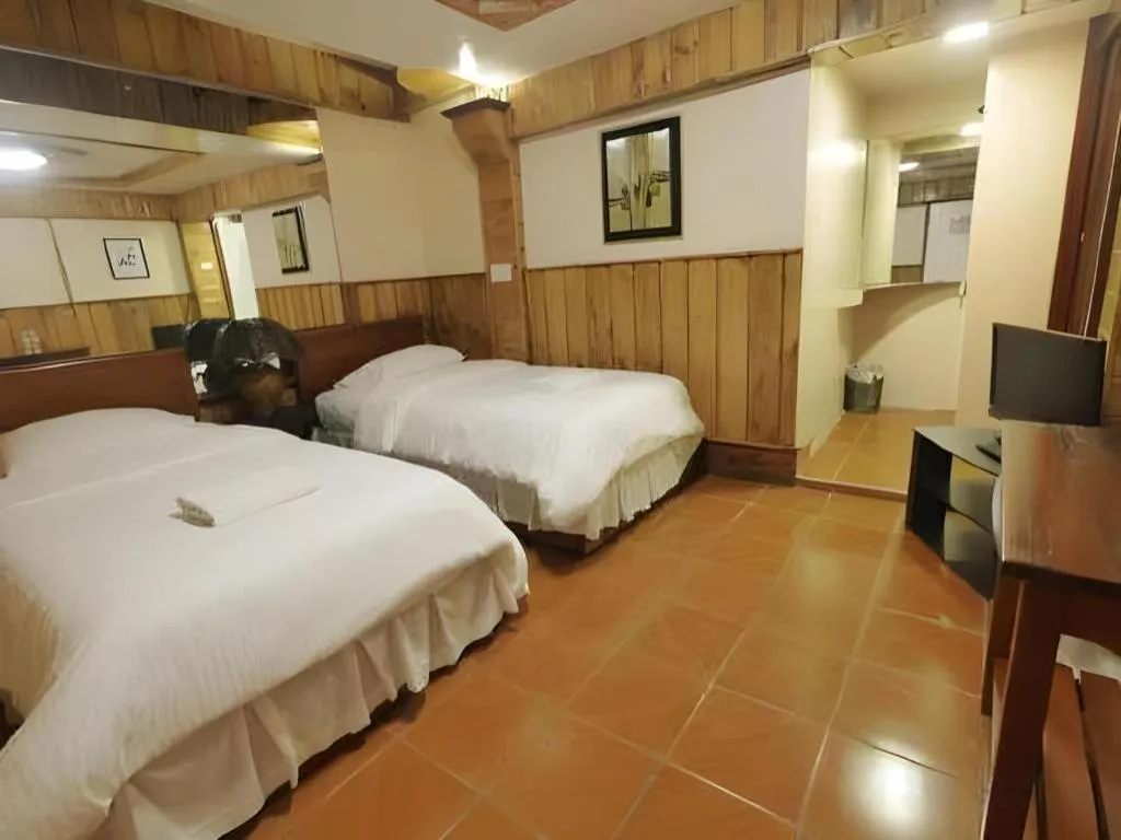 Bed in Mountain Lodge Hotel and Restaurant