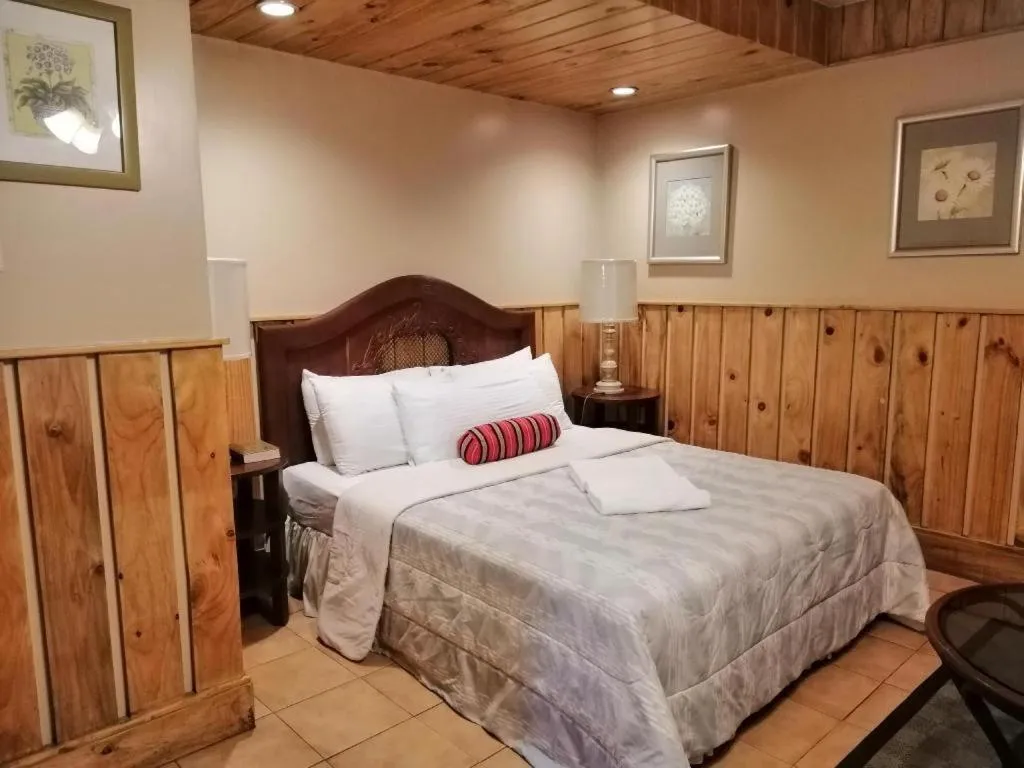 Bed in Mountain Lodge Hotel and Restaurant