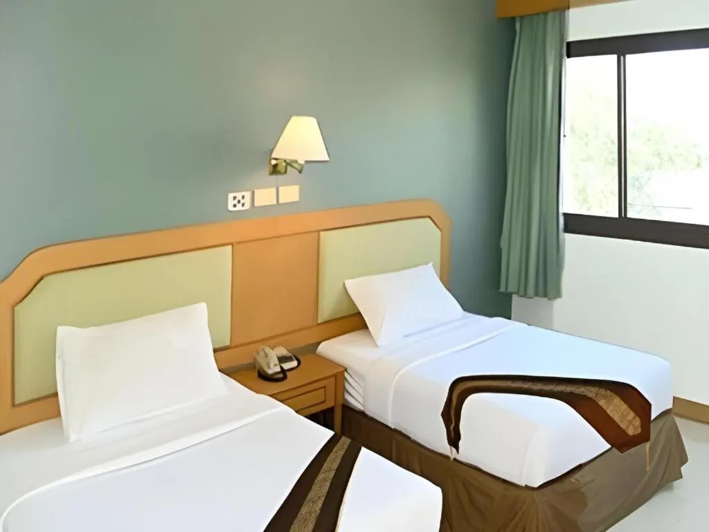 Bed in The Park Hotel Pattaya