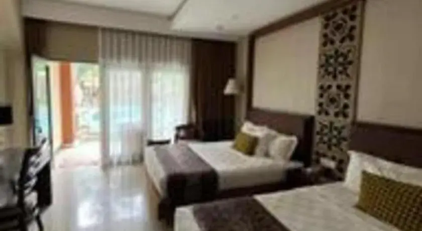 Bed in The Arnawa Hotel Bed in The Arnawa Hotel